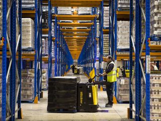 Warehouse logistics workers distributing goods